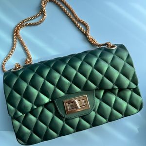 Iridescent green quilted chain bag